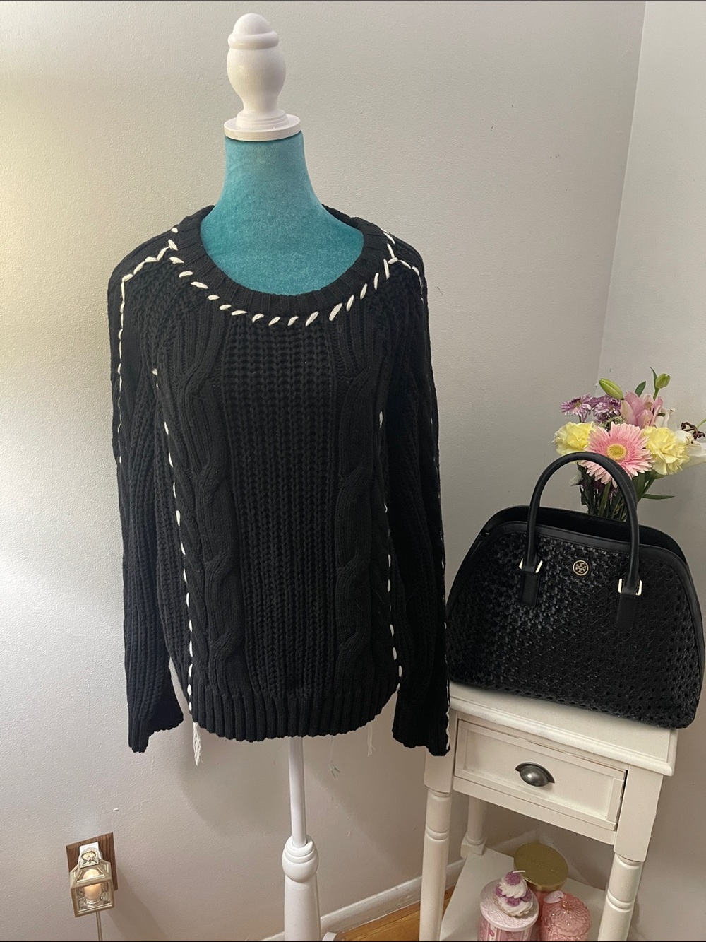 Aaron and Amber Black Cable-Knit Crewneck Sweater with Cream Whipstitch Detail